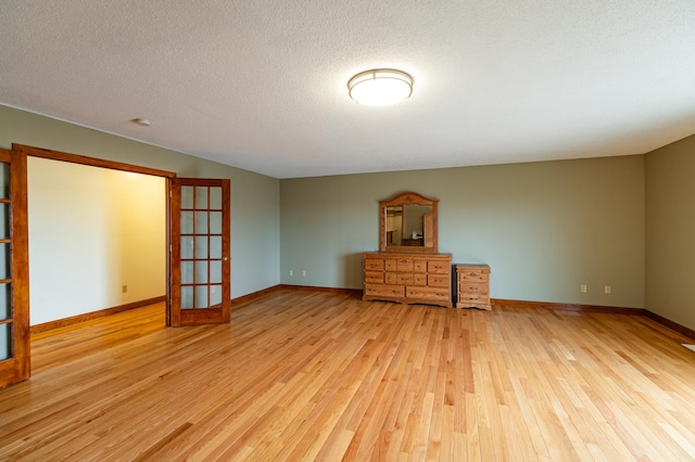 34506 Pleasant Point Dr, Homer Twp, MN 55987 - unfurnished room with wood finished floors and baseboards