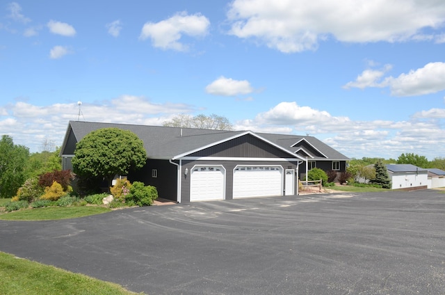 34506 Pleasant Point Dr, Homer Twp, MN 55987 - single story home featuring a garage and asphalt driveway