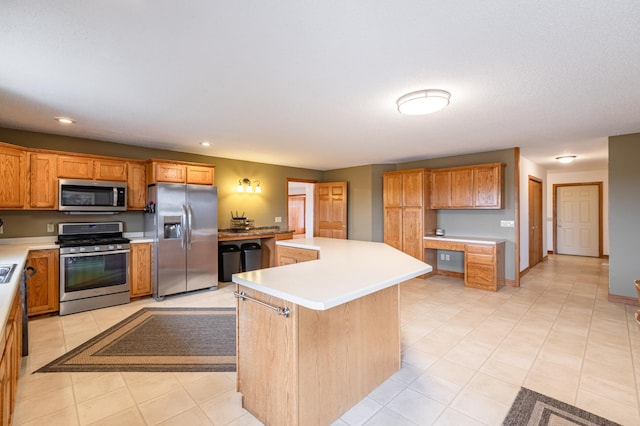 34506 Pleasant Point Dr, Homer Twp, MN 55987 - kitchen featuring stainless steel appliances, a kitchen island, light countertops, recessed lighting, and light tile patterned floors