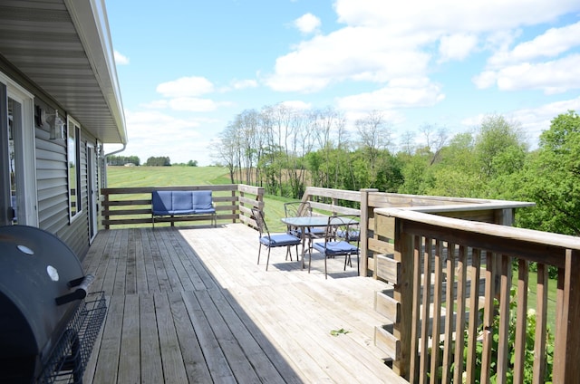 34506 Pleasant Point Dr, Homer Twp, MN 55987 - wooden terrace with grilling area and outdoor dining area