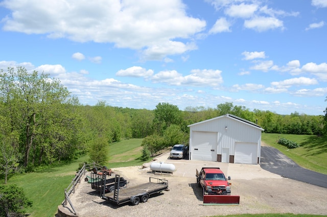 34506 Pleasant Point Dr, Homer Twp, MN 55987 - detached garage with a view of trees
