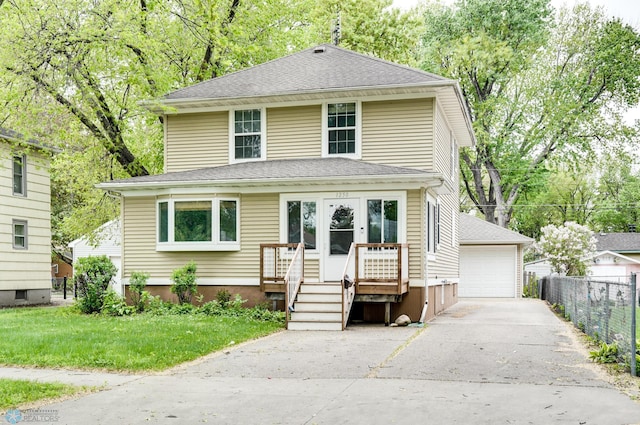 1250 8th St N, Fargo, ND 58102 - traditional style home featuring a garage and an outdoor structure