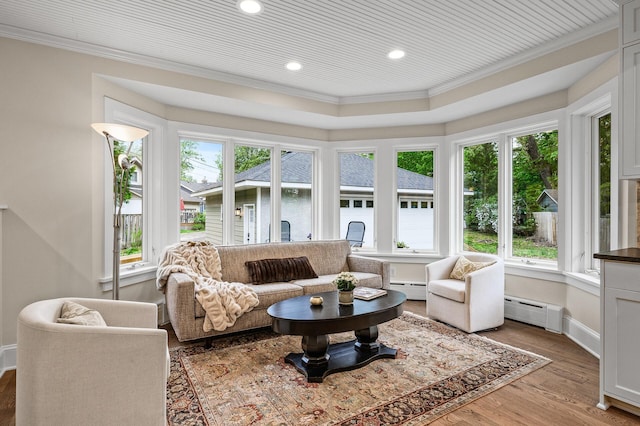 4767 Lake Ave, White Bear Lake, MN 55110 - sunroom / solarium featuring crown molding, a baseboard radiator, baseboard heating, recessed lighting, and wood finished floors