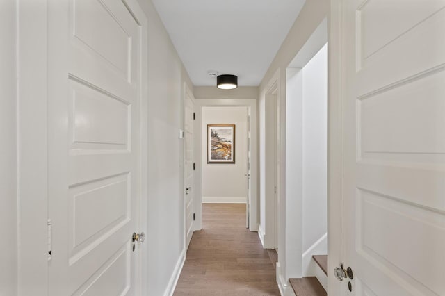 4767 Lake Ave, White Bear Lake, MN 55110 - hallway featuring light wood-style flooring and baseboards