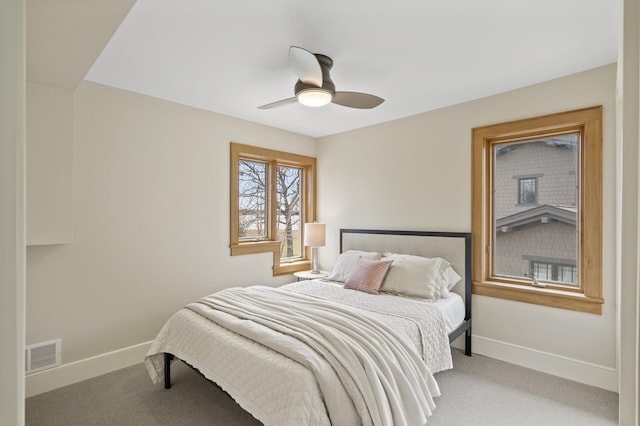 4767 Lake Ave, White Bear Lake, MN 55110 - bedroom featuring carpet floors, baseboards, and ceiling fan