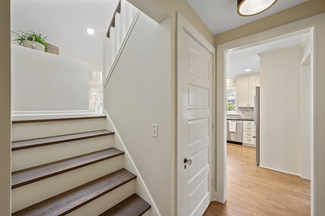 4767 Lake Ave, White Bear Lake, MN 55110 - stairway with wood finished floors and recessed lighting