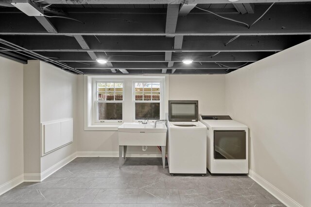 4767 Lake Ave, White Bear Lake, MN 55110 - laundry room featuring washing machine and dryer and baseboards