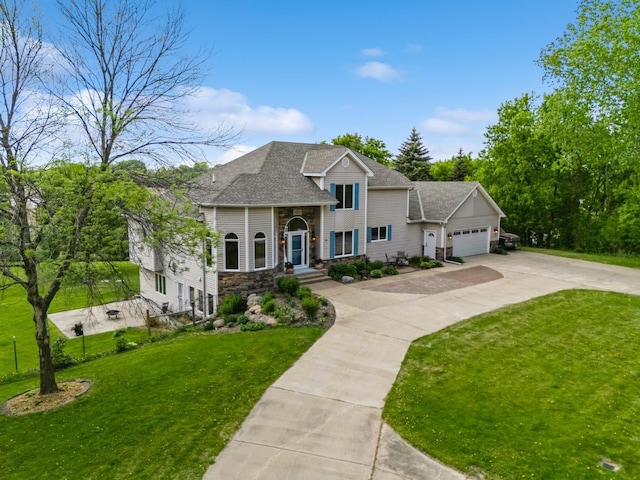 19826 Dakota Ave, Prior Lake, MN 55372 - view of front of property with concrete driveway, an attached garage, a front yard, and a shingled roof