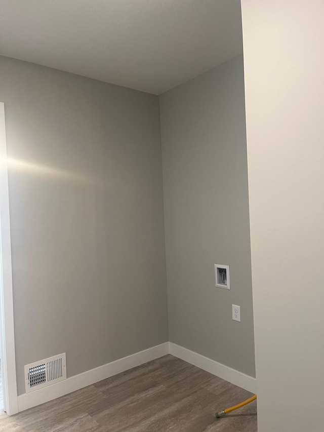 1591 76th St W, Inver Grove Heights, MN 55077 - empty room featuring wood finished floors and baseboards