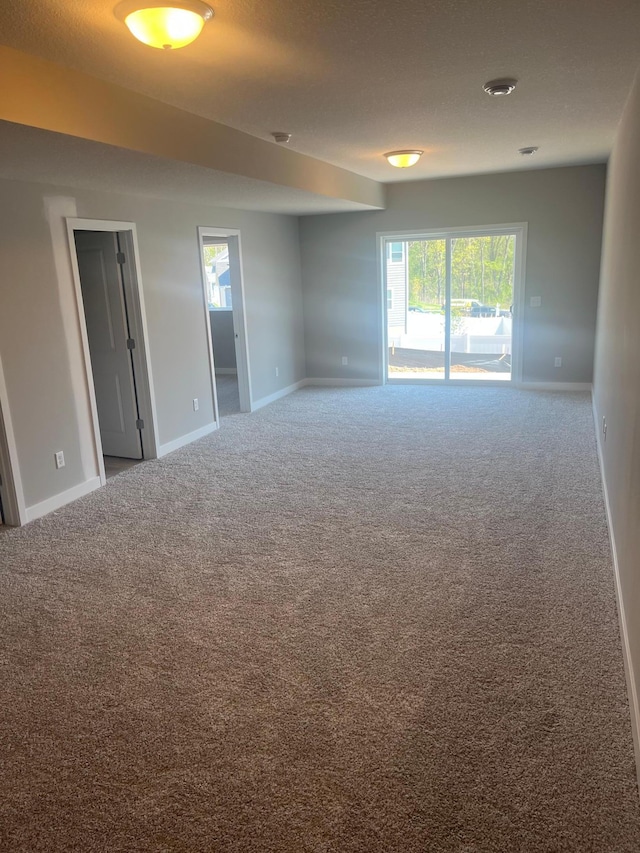1591 76th St W, Inver Grove Heights, MN 55077 - carpeted spare room featuring baseboards and plenty of natural light