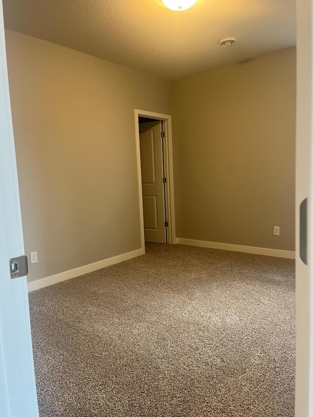 1591 76th St W, Inver Grove Heights, MN 55077 - unfurnished room with carpet and baseboards