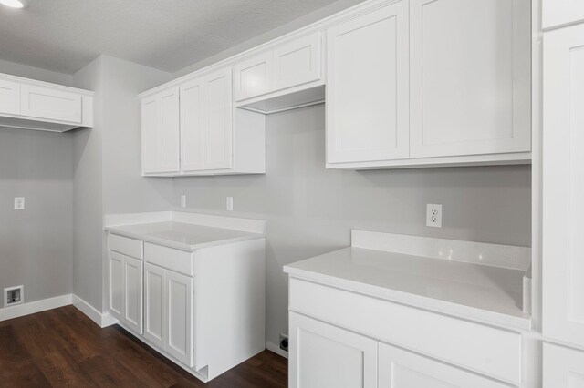 1591 76th St W, Inver Grove Heights, MN 55077 - laundry room featuring dark wood-style flooring and baseboards