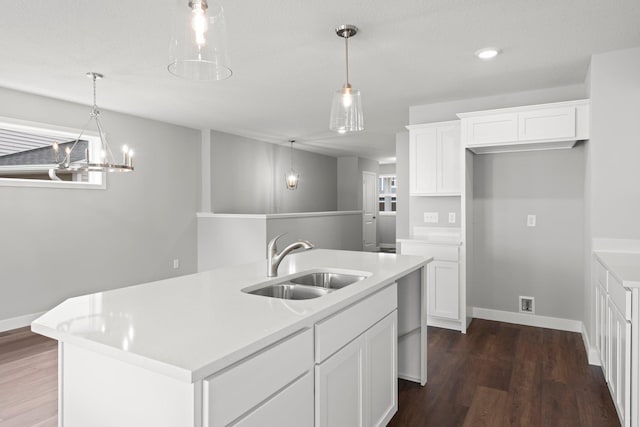 1591 76th St W, Inver Grove Heights, MN 55077 - kitchen with a sink, baseboards, dark wood-type flooring, white cabinets, and recessed lighting