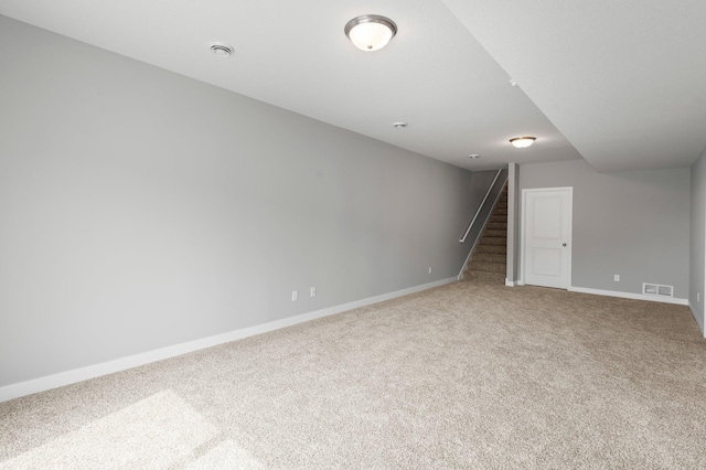 1591 76th St W, Inver Grove Heights, MN 55077 - finished below grade area with carpet, baseboards, and stairs