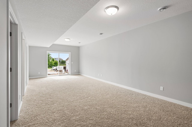 1591 76th St W, Inver Grove Heights, MN 55077 - empty room with light carpet, baseboards, and a textured ceiling