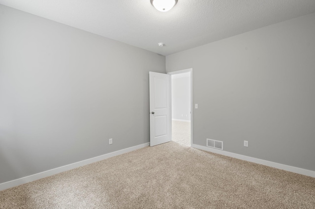 1591 76th St W, Inver Grove Heights, MN 55077 - unfurnished room featuring light carpet and baseboards