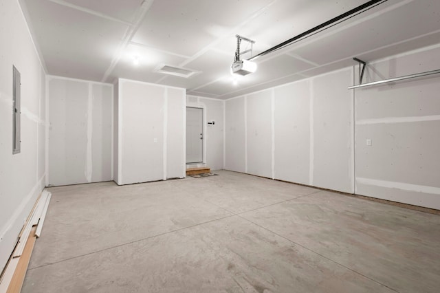 1591 76th St W, Inver Grove Heights, MN 55077 - garage featuring a garage door opener and electric panel