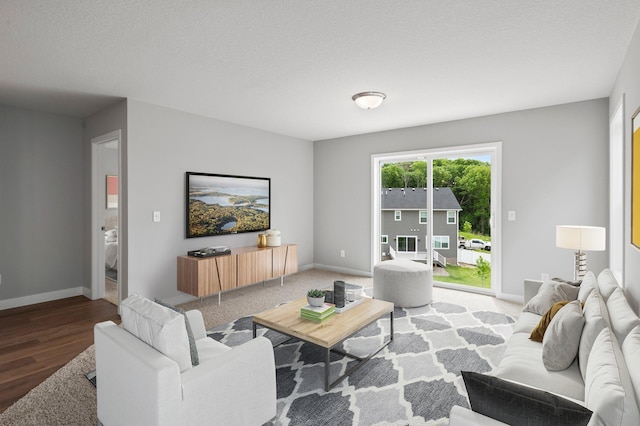 1591 76th St W, Inver Grove Heights, MN 55077 - living room featuring wood finished floors and baseboards