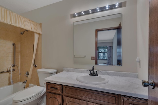 bathroom with toilet, bathing tub / shower combination, and vanity