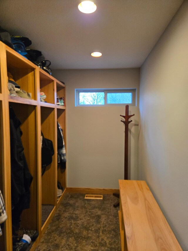 mudroom featuring visible vents and baseboards