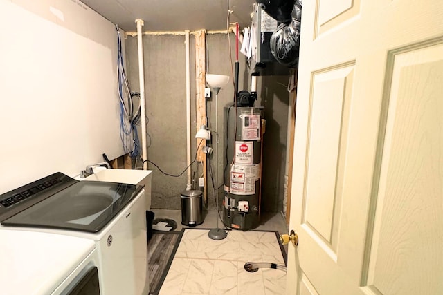 716 Desoto St, Saint Paul, MN 55130 - clothes washing area featuring laundry area, marble finish floor, gas water heater, and washing machine and dryer