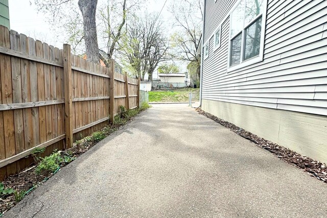 716 Desoto St, Saint Paul, MN 55130 - view of patio featuring fence