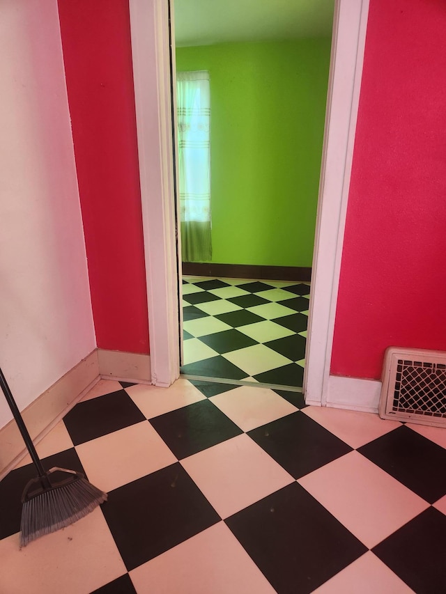 610 Grand Ave, Worthington, MN 56187 - hall with tile patterned floors and baseboards