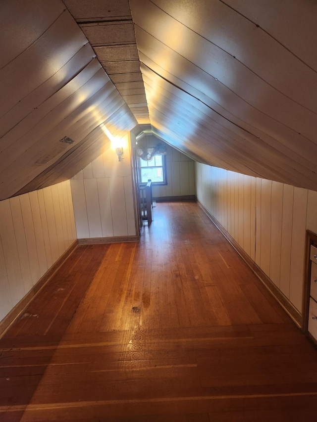 610 Grand Ave, Worthington, MN 56187 - bonus room with hardwood / wood-style flooring, vaulted ceiling, and wood walls
