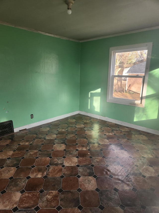 610 Grand Ave, Worthington, MN 56187 - unfurnished room with crown molding