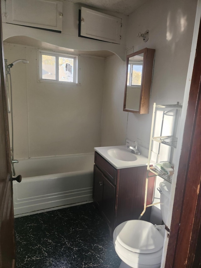 610 Grand Ave, Worthington, MN 56187 - full bath featuring vanity, toilet, and shower / bath combination