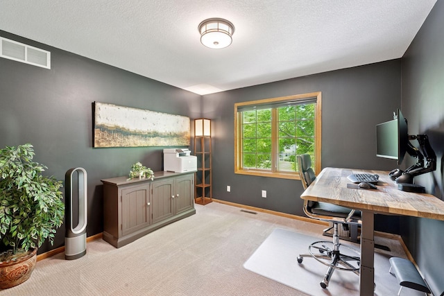 office area featuring light colored carpet and baseboards