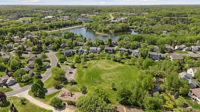 aerial view of residential area with a large body of water