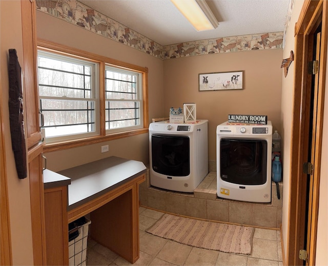 laundry room with cabinet space and independent washer and dryer