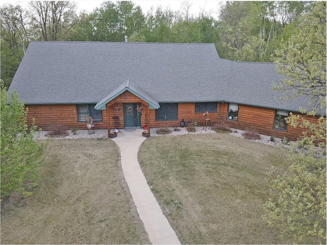 36101 159th Ave, Bagley, MN 56621 - log home featuring a shingled roof and a front yard