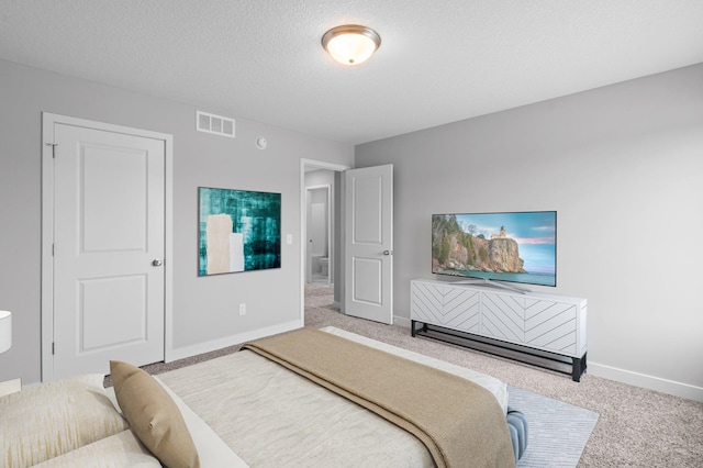 1595 76th St W, Inver Grove Heights, MN 55077 - bedroom with carpet flooring, baseboards, and a textured ceiling