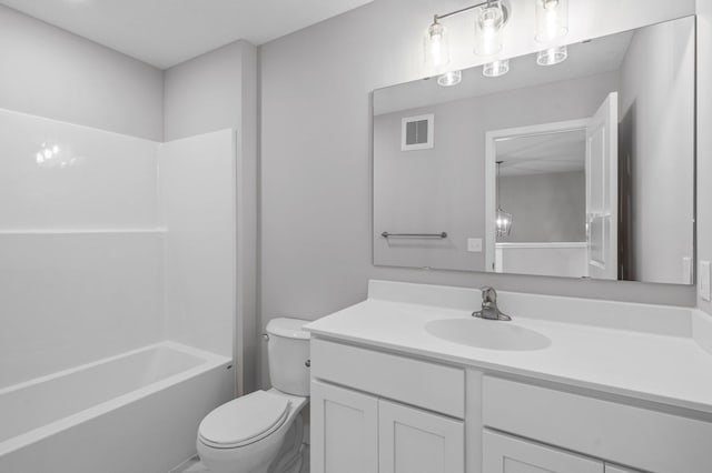 1595 76th St W, Inver Grove Heights, MN 55077 - full bath featuring toilet, vanity, and shower / washtub combination