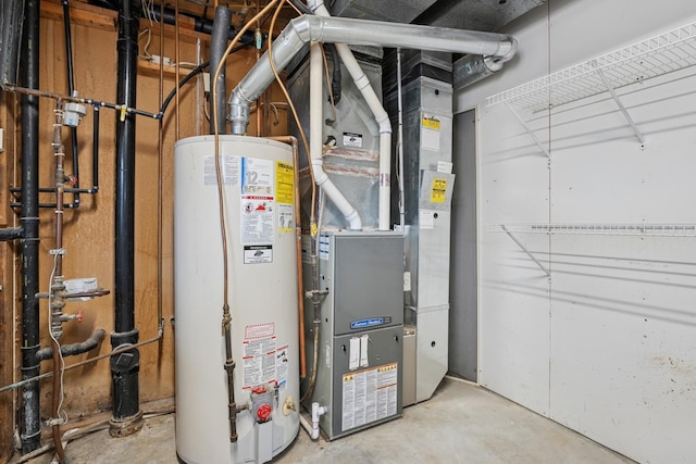 utility room featuring gas water heater