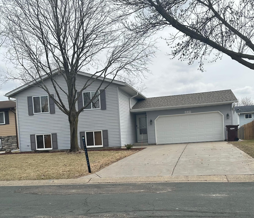 18125 Echo Ter, Farmington, MN 55024 - tri-level home featuring an attached garage and concrete driveway