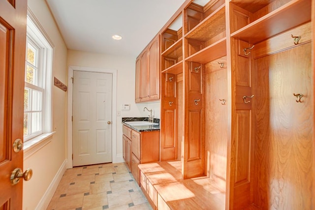 4927 Lake Ave, White Bear Lake, MN 55110 - mudroom with baseboards, a sink, light floors, and recessed lighting