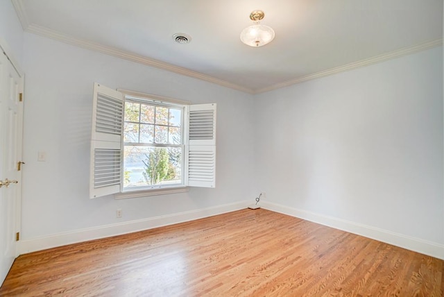 4927 Lake Ave, White Bear Lake, MN 55110 - empty room with light wood-style floors, baseboards, and crown molding