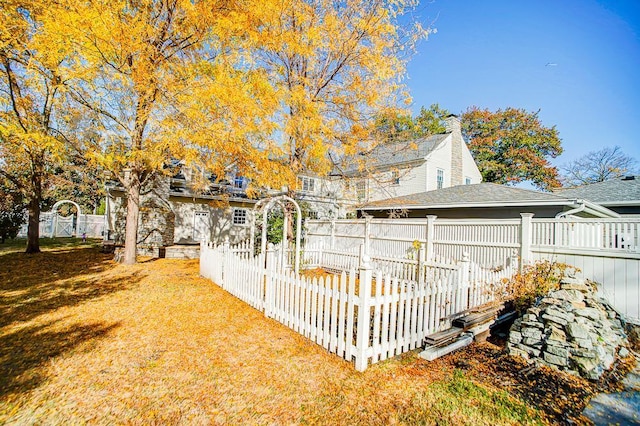 4927 Lake Ave, White Bear Lake, MN 55110 - view of home's exterior featuring roof with shingles and a fenced backyard