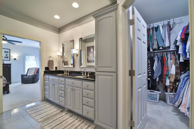 6203 Fairfax Ct, Baxter, MN 56425 - full bathroom with double vanity, ceiling fan, and recessed lighting