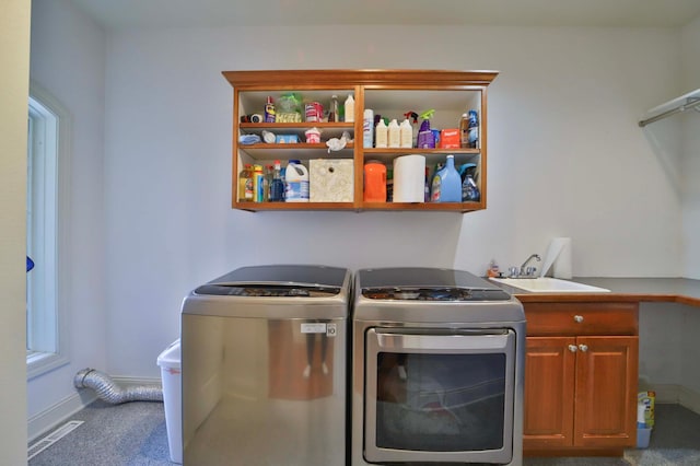 6203 Fairfax Ct, Baxter, MN 56425 - laundry room featuring cabinet space, washing machine and dryer, carpet flooring, and baseboards