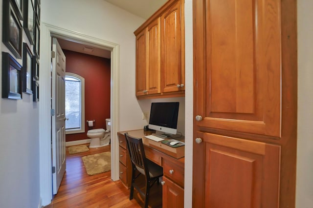 6203 Fairfax Ct, Baxter, MN 56425 - office space with light wood-style flooring and built in study area