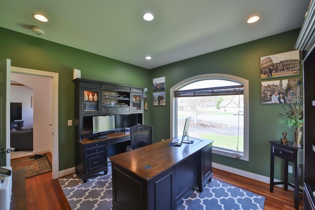 6203 Fairfax Ct, Baxter, MN 56425 - office space featuring dark wood finished floors, baseboards, recessed lighting, and arched walkways