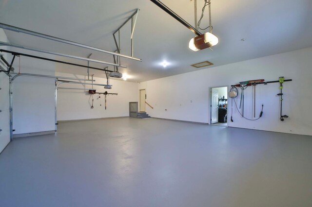 6203 Fairfax Ct, Baxter, MN 56425 - garage featuring a garage door opener