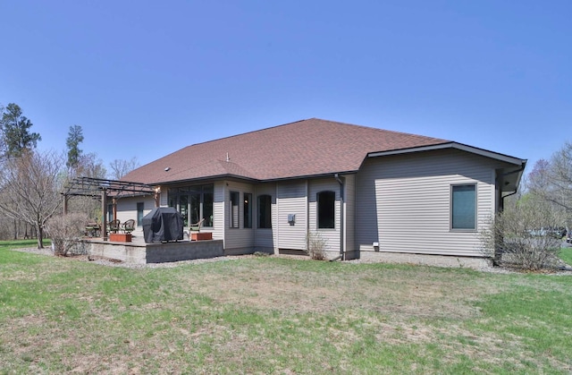 6203 Fairfax Ct, Baxter, MN 56425 - back of house featuring a pergola, a yard, a patio area, and a sunroom