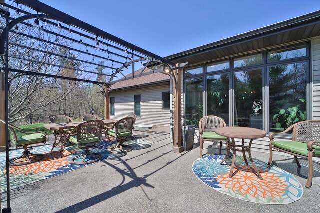 6203 Fairfax Ct, Baxter, MN 56425 - view of patio with outdoor dining area and a pergola