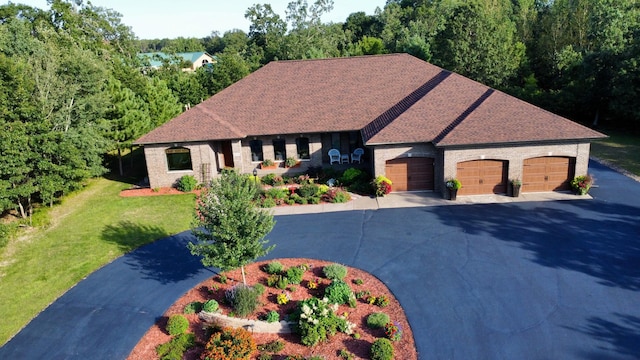 6203 Fairfax Ct, Baxter, MN 56425 - view of front of property with driveway, a garage, a front lawn, and brick siding