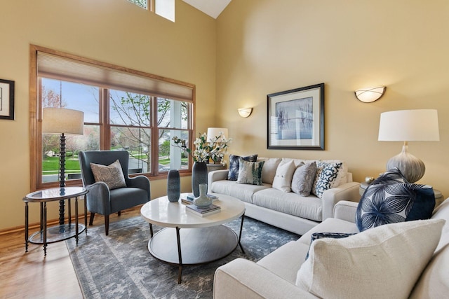 4633 Stonecliffe Dr, Eagan, MN 55122 - living area with wood finished floors, plenty of natural light, and a towering ceiling